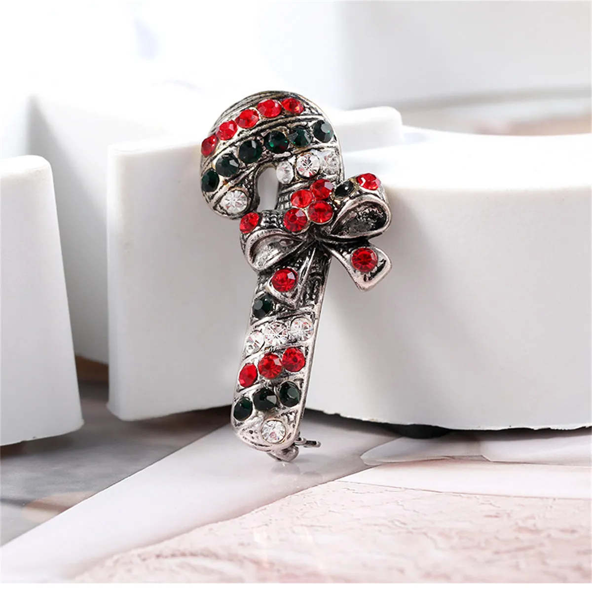 Black & Red Cubic Zirconia & Silver-Plated Bow Candy Cane Brooch