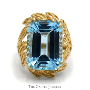 Emerald Cut Blue Topaz Ring with Fancy Leaf Designed Open Setting in 10k Yellow Gold