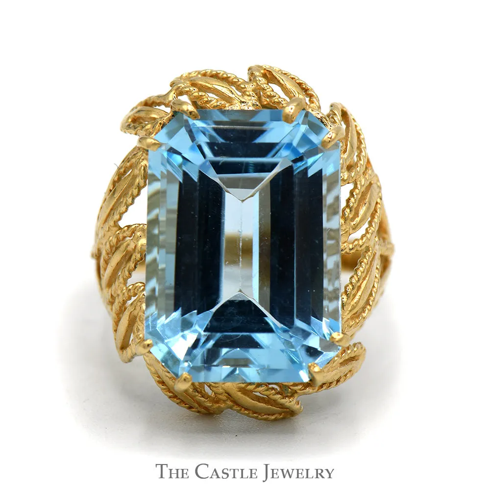 Emerald Cut Blue Topaz Ring with Fancy Leaf Designed Open Setting in 10k Yellow Gold