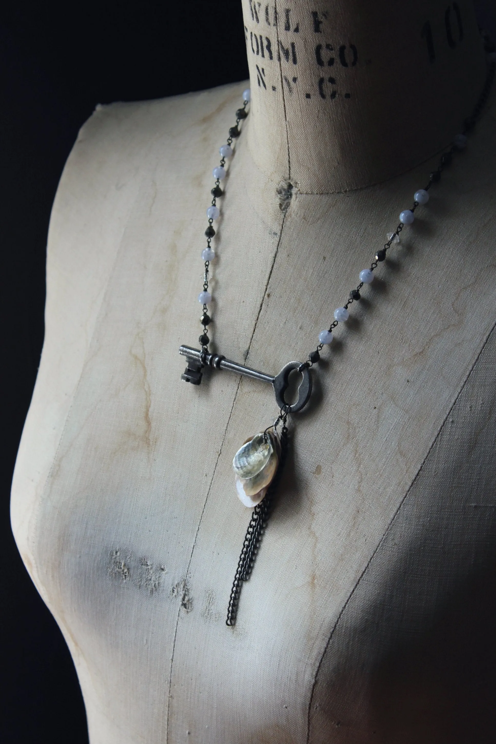 Kedge Cottage. Storyteller Series. Rustic Beach Seashell, Skeleton Key and Gemstone Necklace.